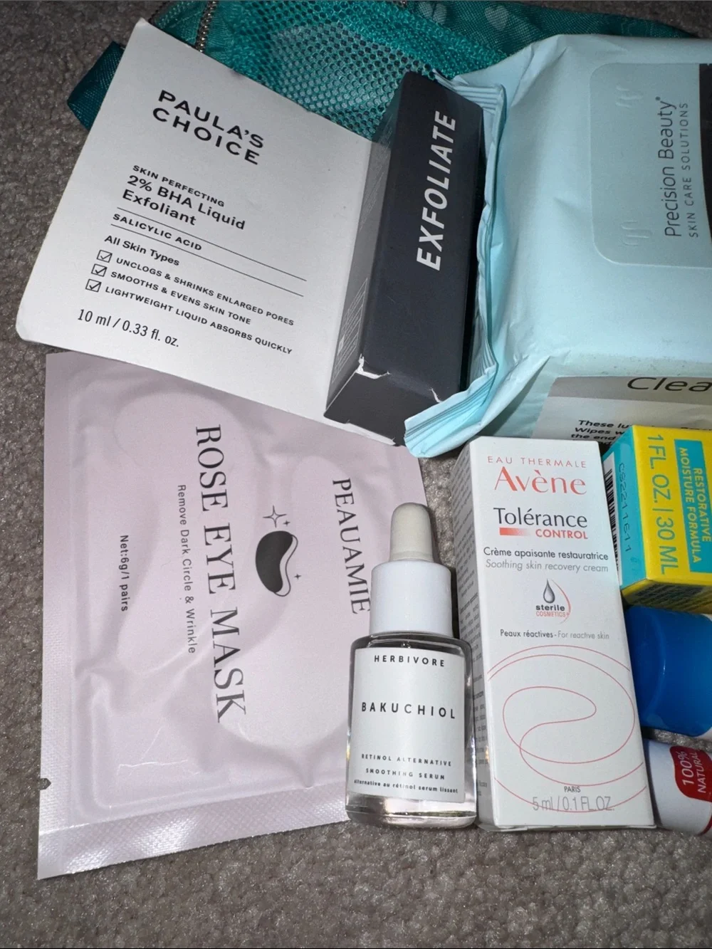Paula's Choice Skincare Set with Teal Pouch and Assorted Essentials